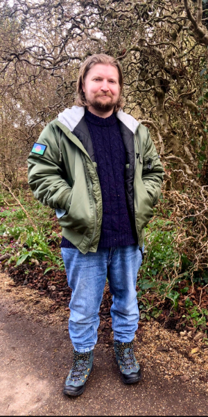 Sean Smith, University of Essex student, standing outside with his hands in his coat pockets.