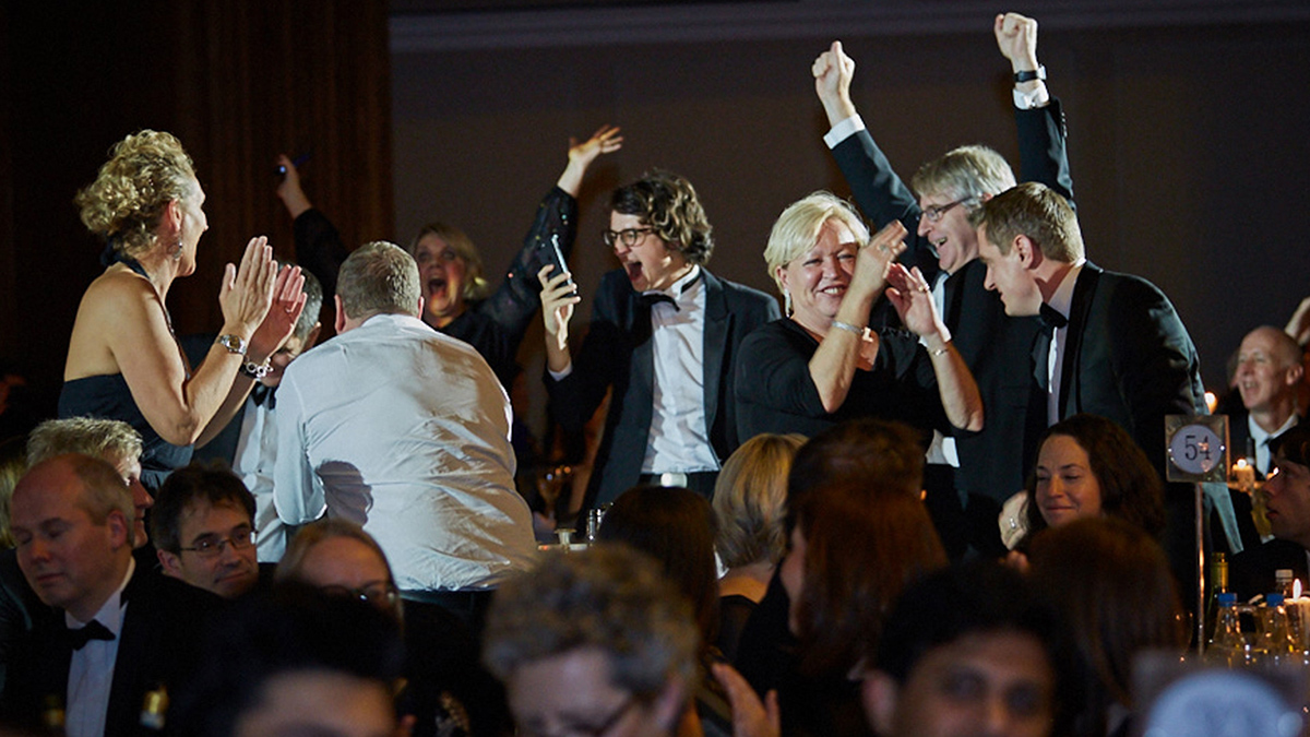 Staff celebrating University of the Year award win 2018)