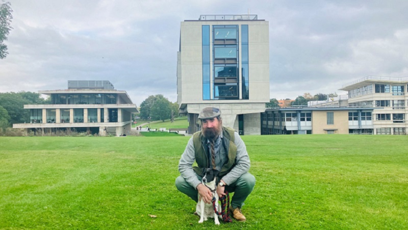 Chris Cunningham with his dog at Colchester Campus