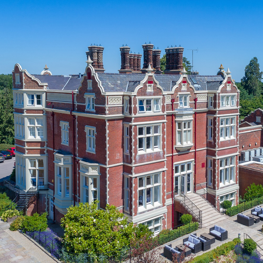 Aerial view of Wivenhoe House Hotel on a sunny day