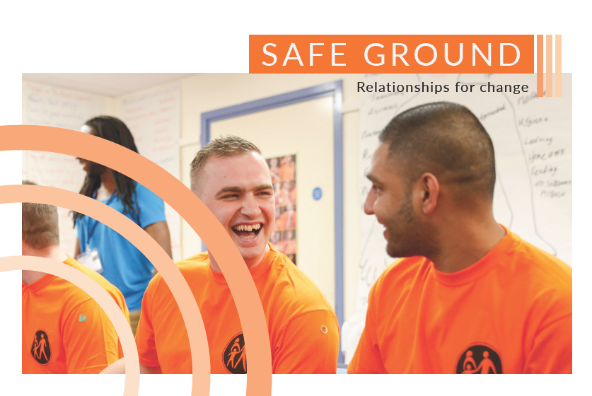 A Safe Ground promotional graphic with their orange branding depicting two males engaged in a conversation wearing Safe Ground branded tee shirts.