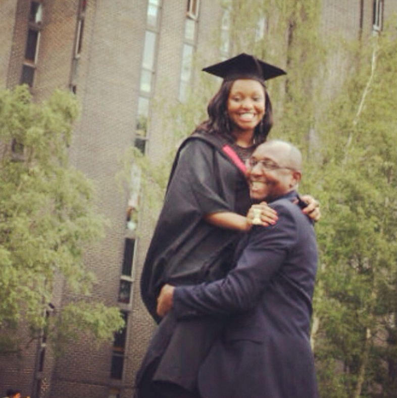 Isimeme with her father on her graduation day