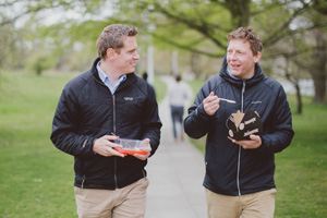 Two colleagues having a walking meeting