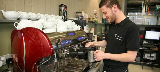 Barista making coffee in the Lakeside cafe
