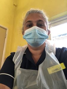Dr Camille Cronin in PPE working as a COVID-19 vaccinator