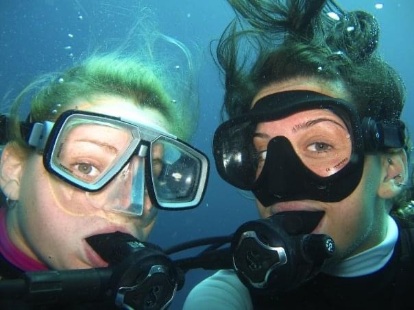 Amie and a friend scuba diving.