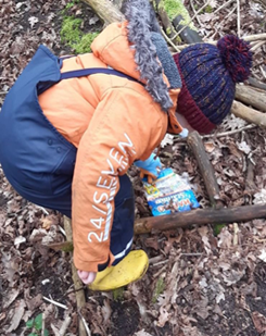 Nursery children cleaning up the campus