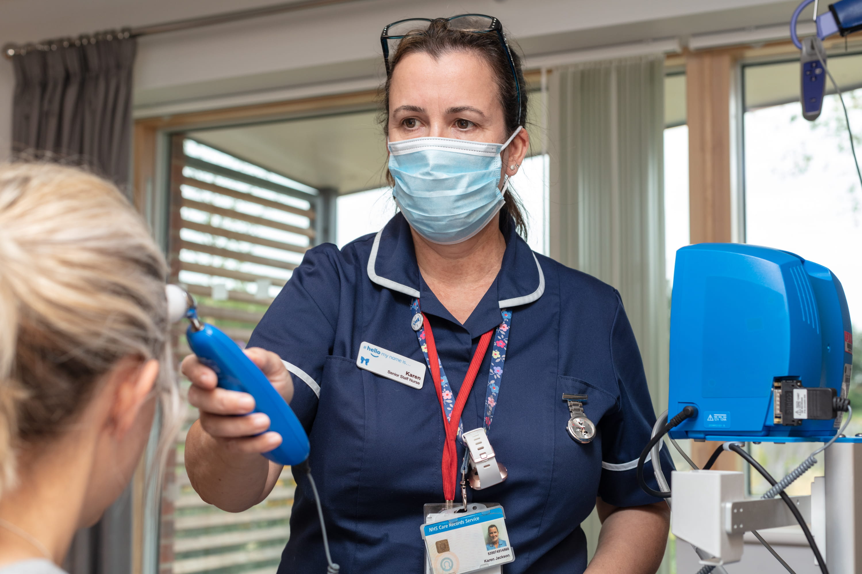 Female nurse with patient image supplied by Havens Hospices