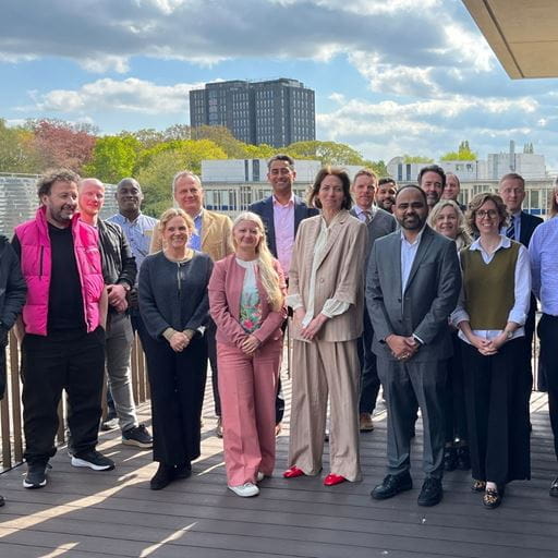 Group of people standing in row