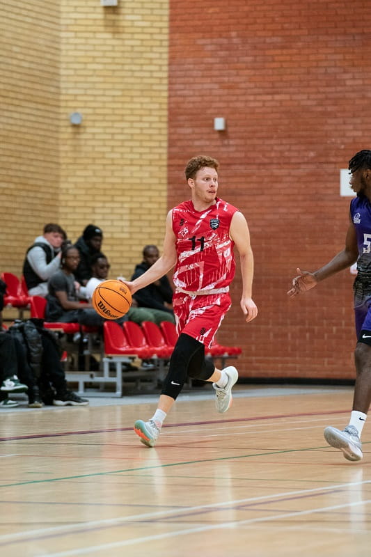 Alejandro Vega-Fondona men's BUCS and D3 Essex Rebels basketball player in game action 