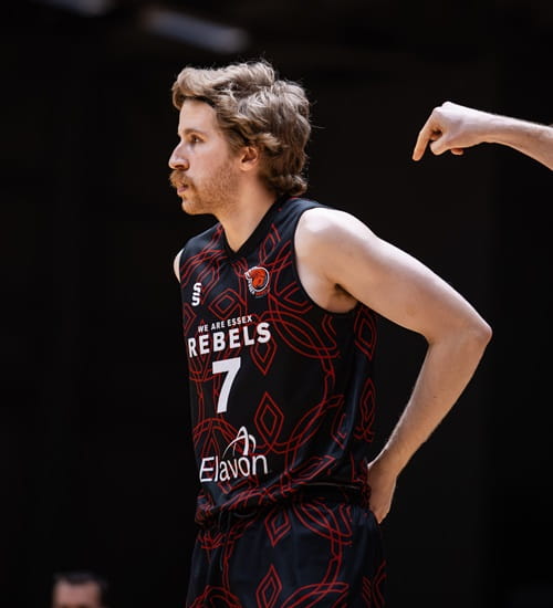 University of Essex men's basketballer Johnny McKew in Essex Rebels kit at Essex Sport Arena on game day