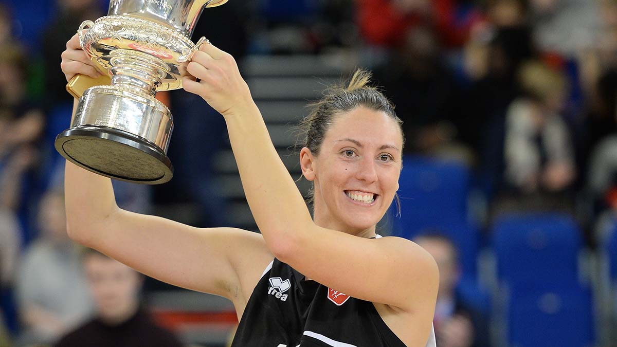 Emma Camp lifting the trophy after winning the Basketball England National Cup in 2016