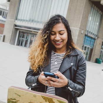 A clearing student contacting the University of Essex on a phone.