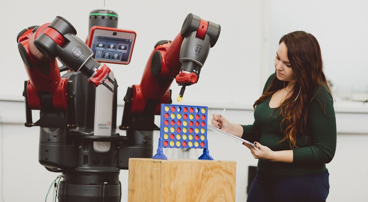 One of our students with the Baxter robot in the robotics lab at Essex. 