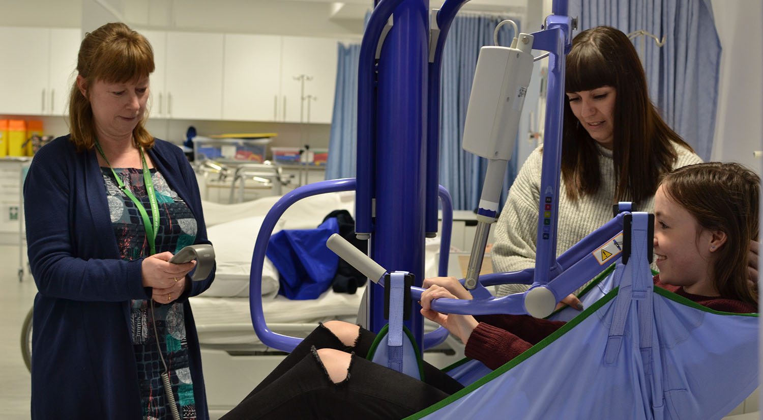 Occupational Therapy students practising using a hoist