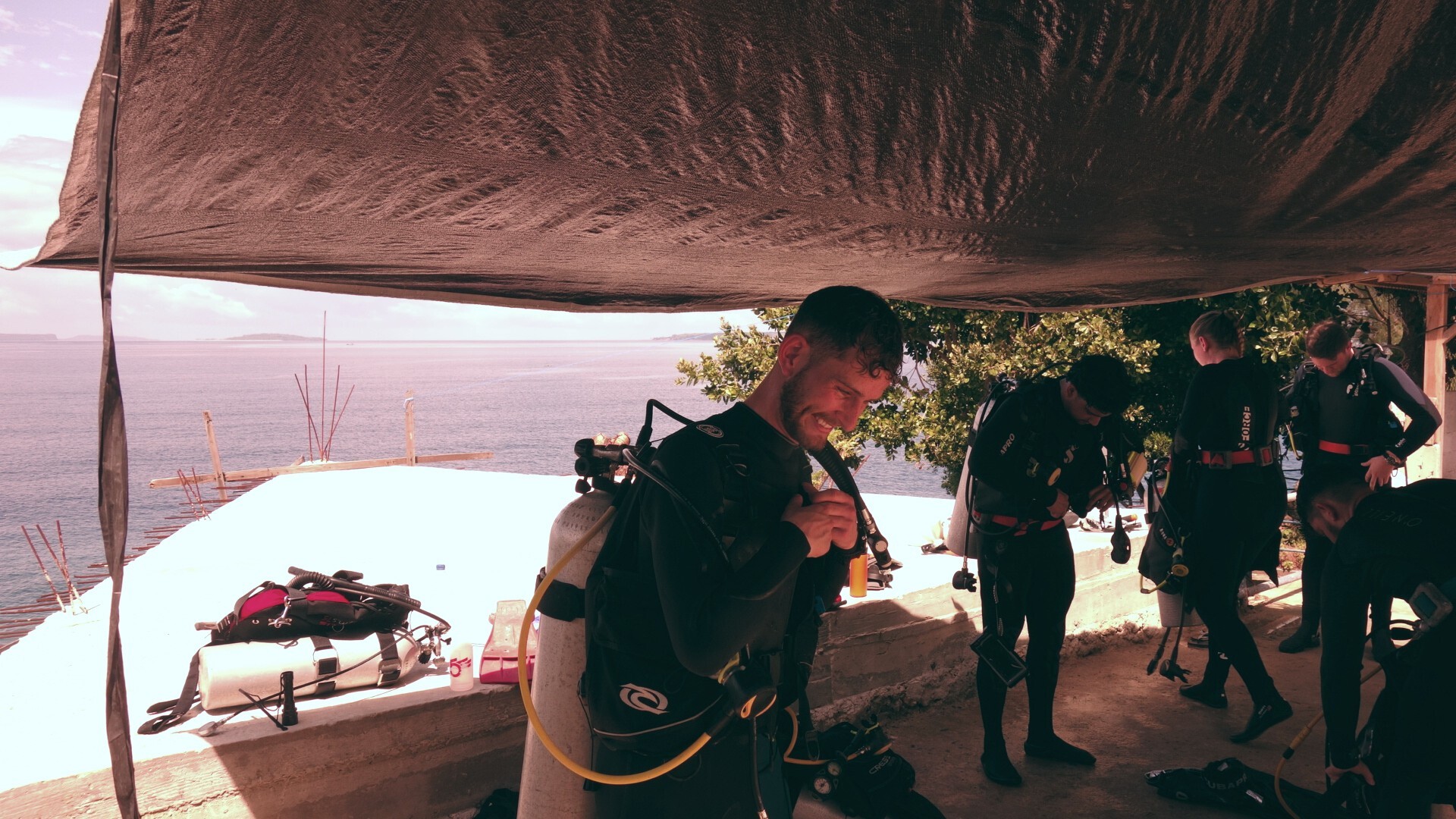 Scuba divers getting dressed