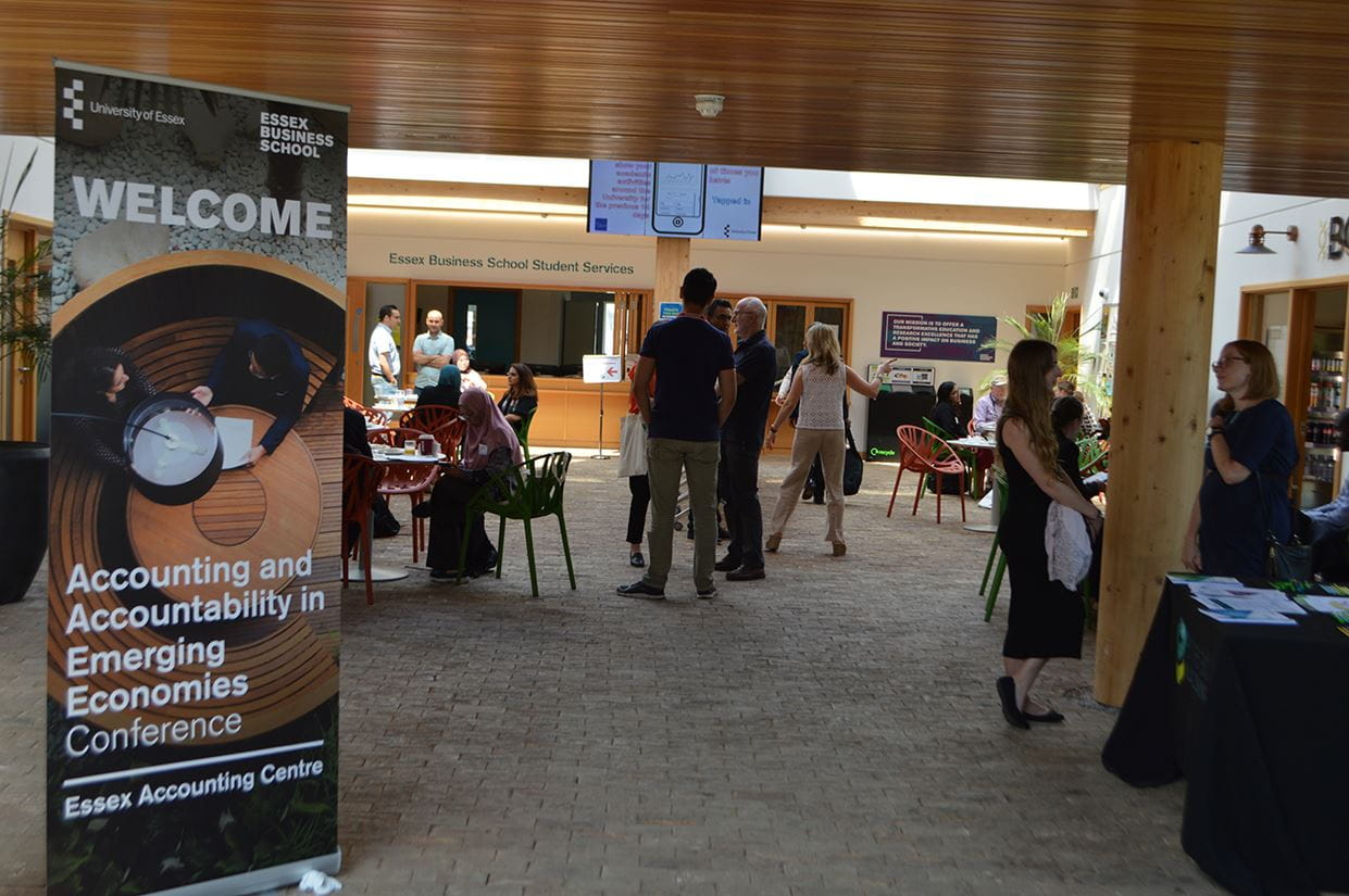 Waiting patiently in the foyer for the Accounting and Accountability in Emerging Economies conference to start.