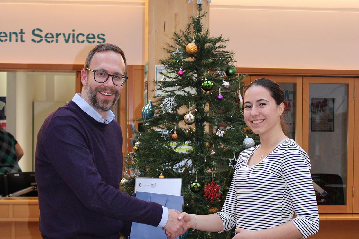 Acting Dean of Essex Business School, Professor Neil Kellard, presents the Pearson Prize to Ivona Tajslova.