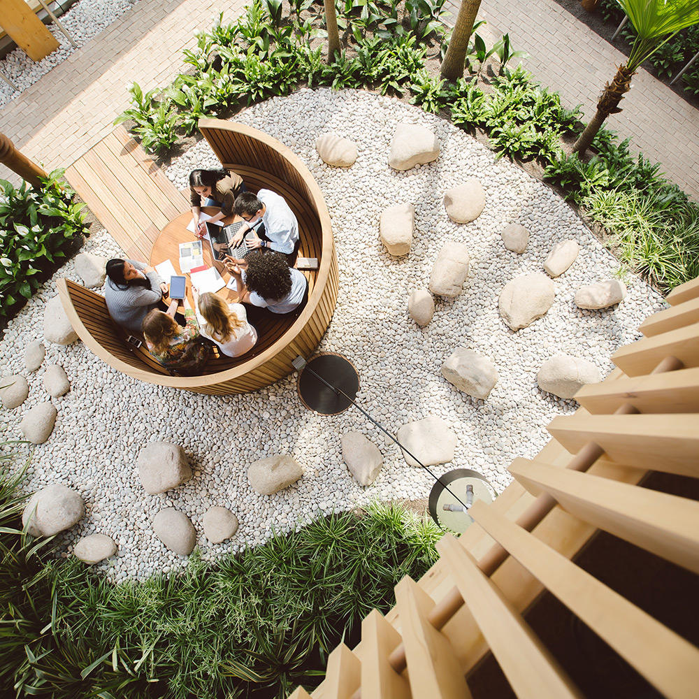 Students sitting in winter garden at Essex Business School