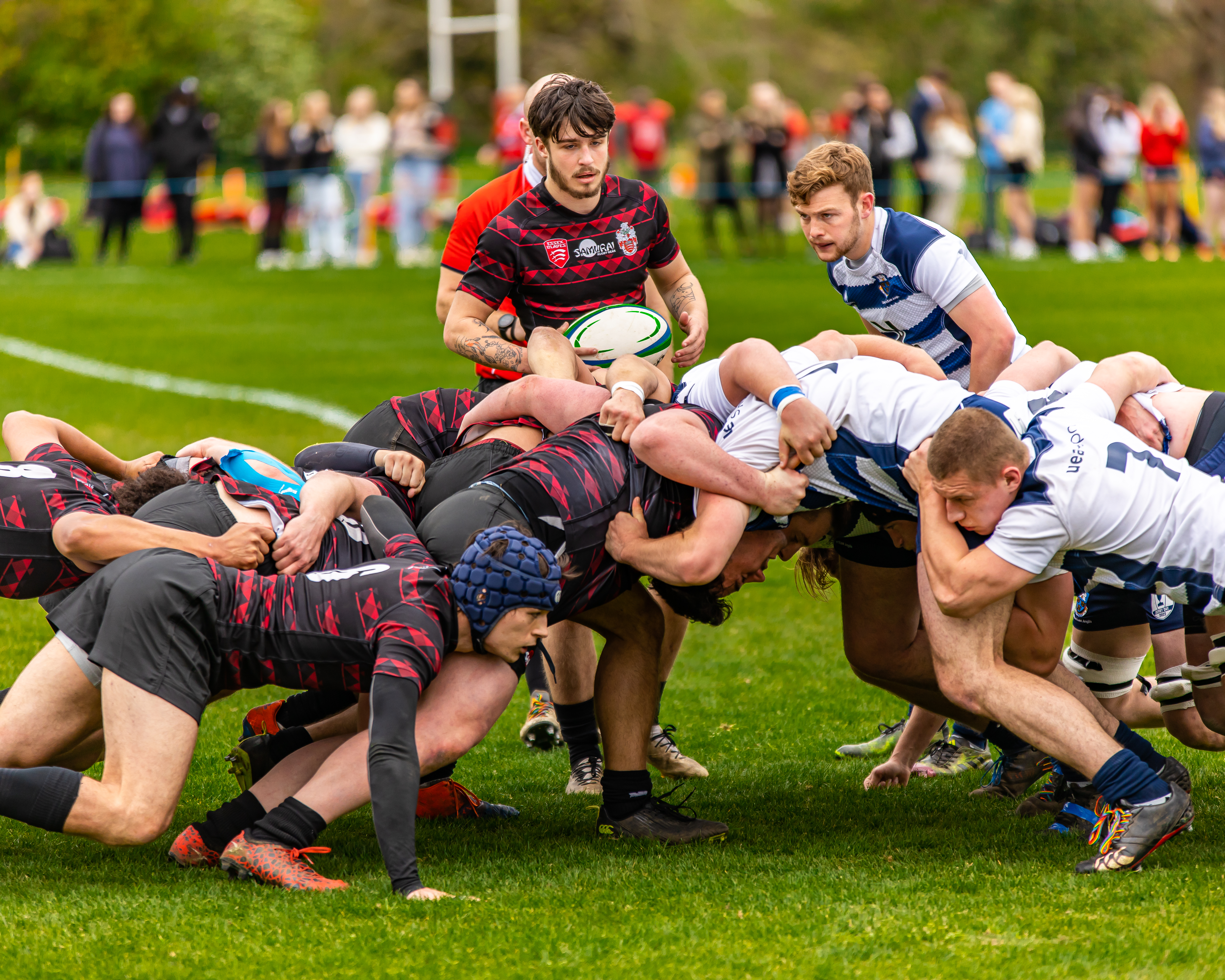 University of Essex Mens Rugby Team in a scrum with the University of East Anglia on Derby Day