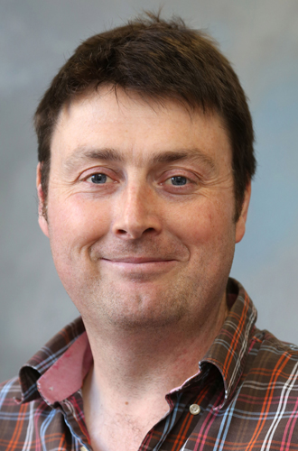 A head and shoulders photo of Dr Tom Cameron from the School of Life Sciences.