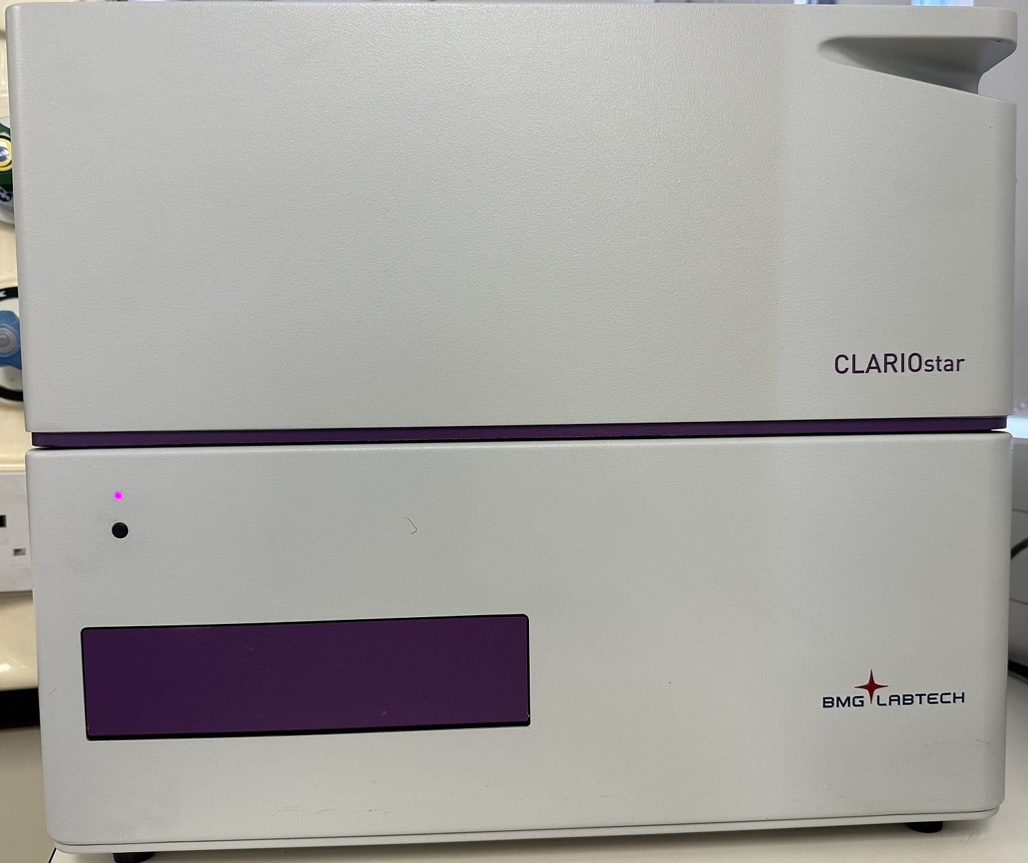 The CLARIOstar plate reader, a large white plastic box with a purple rectangle on the bottom left.