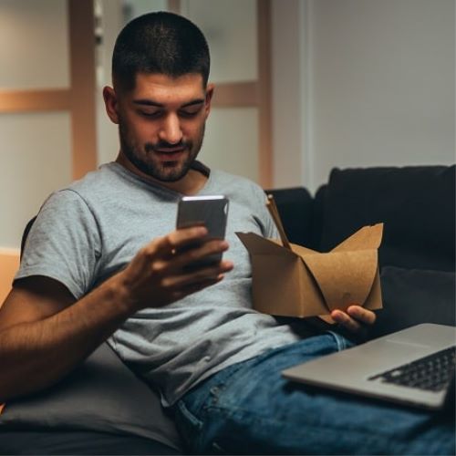 A person applying to the University of Essex using their mobile phone.