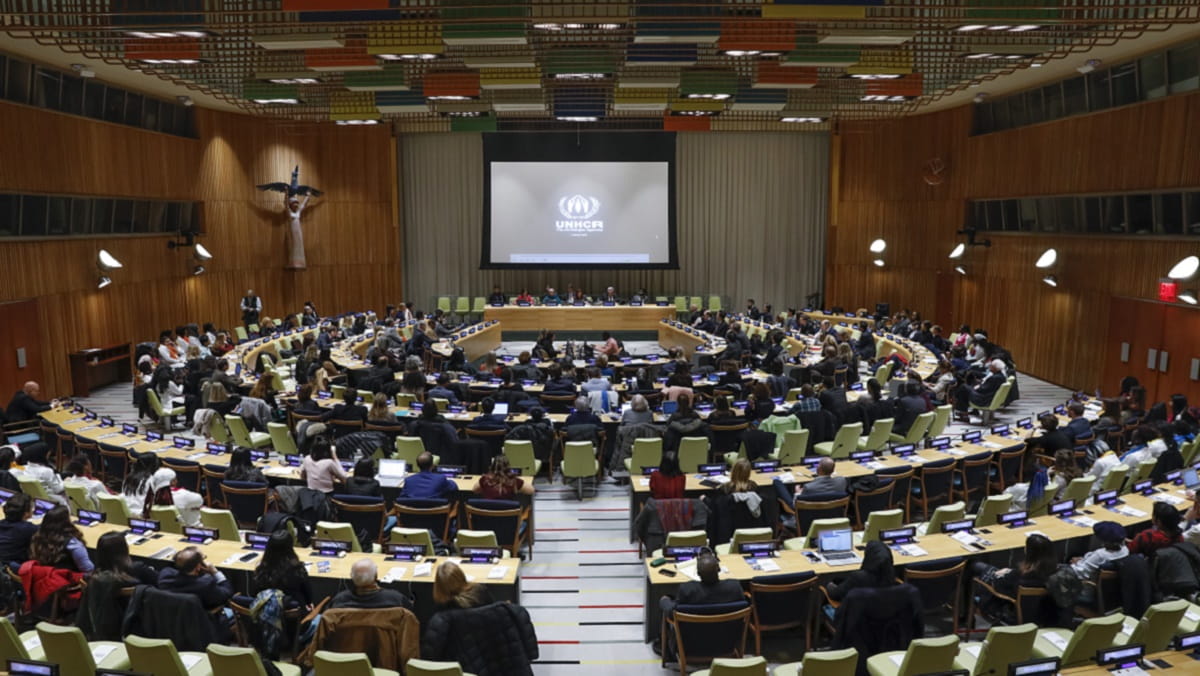 Attendees listen to speeches at the Global Compact on Refugees meeting at the UN Headquarters in New York. © UNHCR/Andrew Kelly)