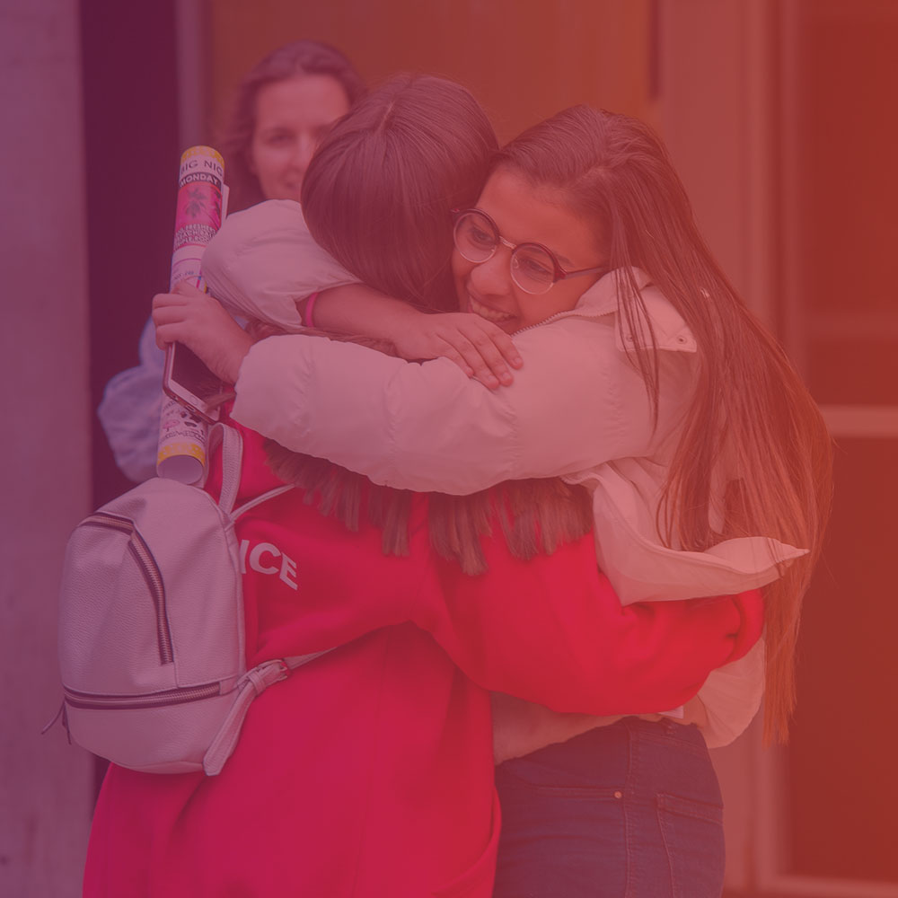 Students hugging on their first day at the University of Essex