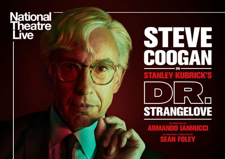 National Theatre Live. Steve Coogan staring down the lens of the camera, in character in the Stanley Kubrick's Dr. Strangelove.