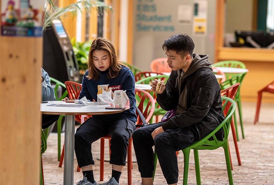 Students enjoying a bite to eat at Bonds, at the Essex Business School on our Colchester Campus