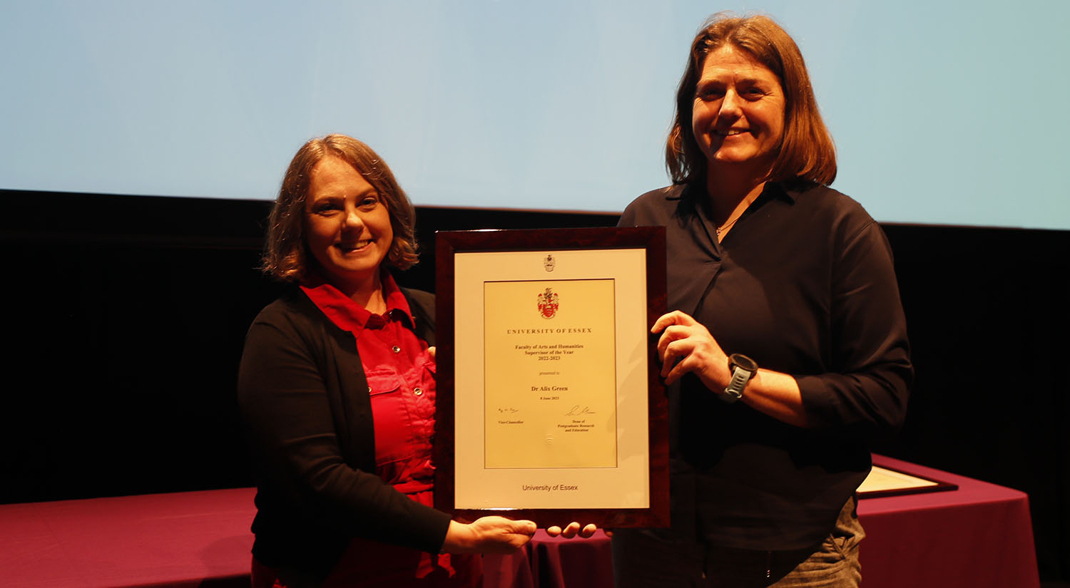 Dr Alix Green receives her award