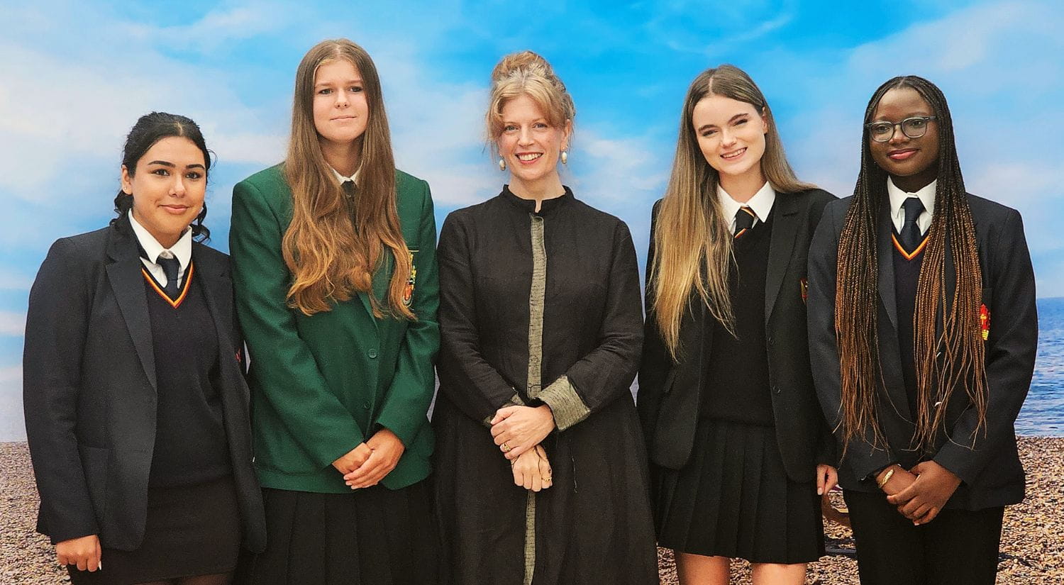 Dr Sarah Perry with the Accent Essex schoolgirls