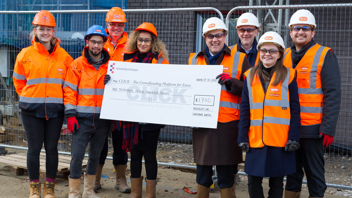 The Bouygues team present their cheque to Essex)