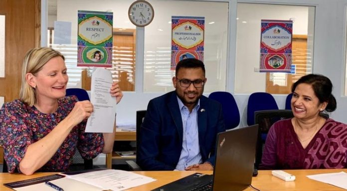 British Council team celebrate online MOU signing)