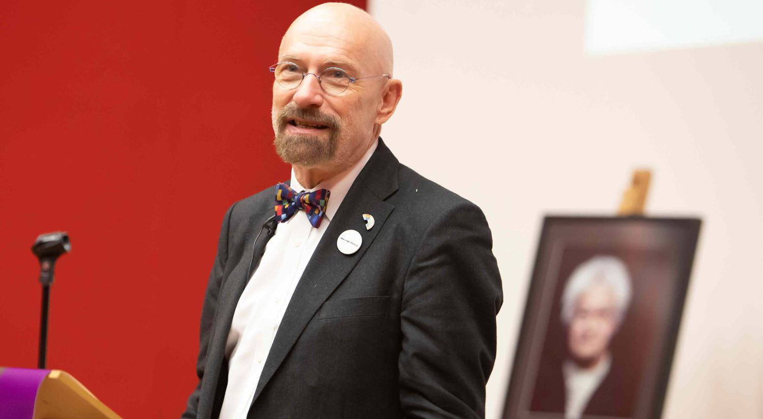 Professor Rainer Schulze speaking at a Dora Love Prize-giving ceremony