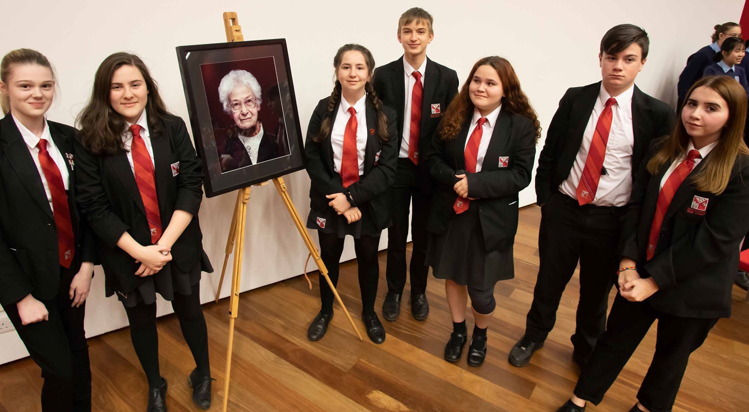Dora Love Prize 2020 runners-up SET Saxmundham School, with a portrait of Dora Love