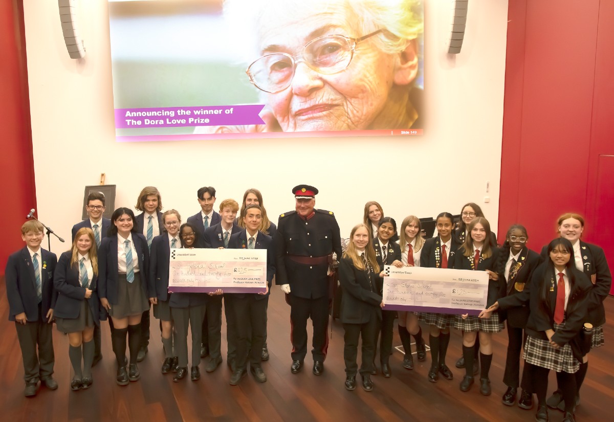 The St Helena School and The Gilberd School team with their awards