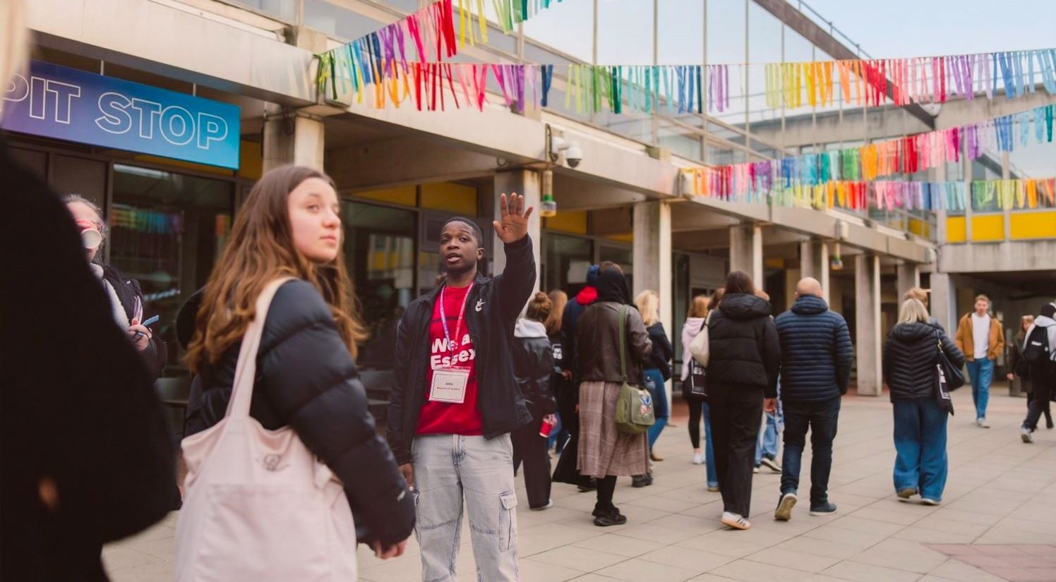 A Student Ambassador showing a group of people around our campus.
