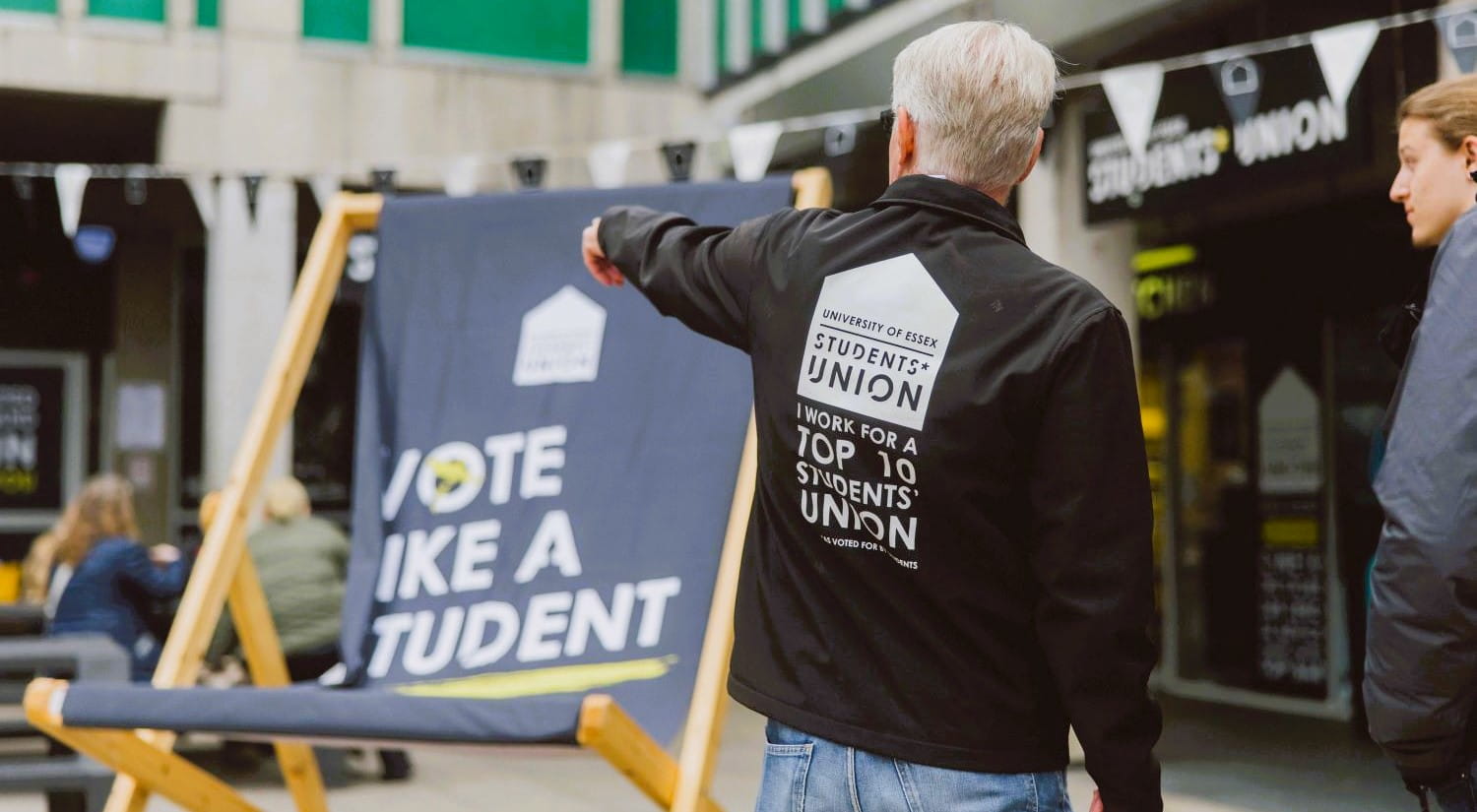 A member of our Students' Union helping a visitor.