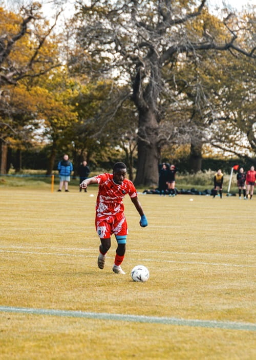 Performance Sport scholar Luwa Luwabela mid-game action dribbling the ball during an Essex Blades BUCS game