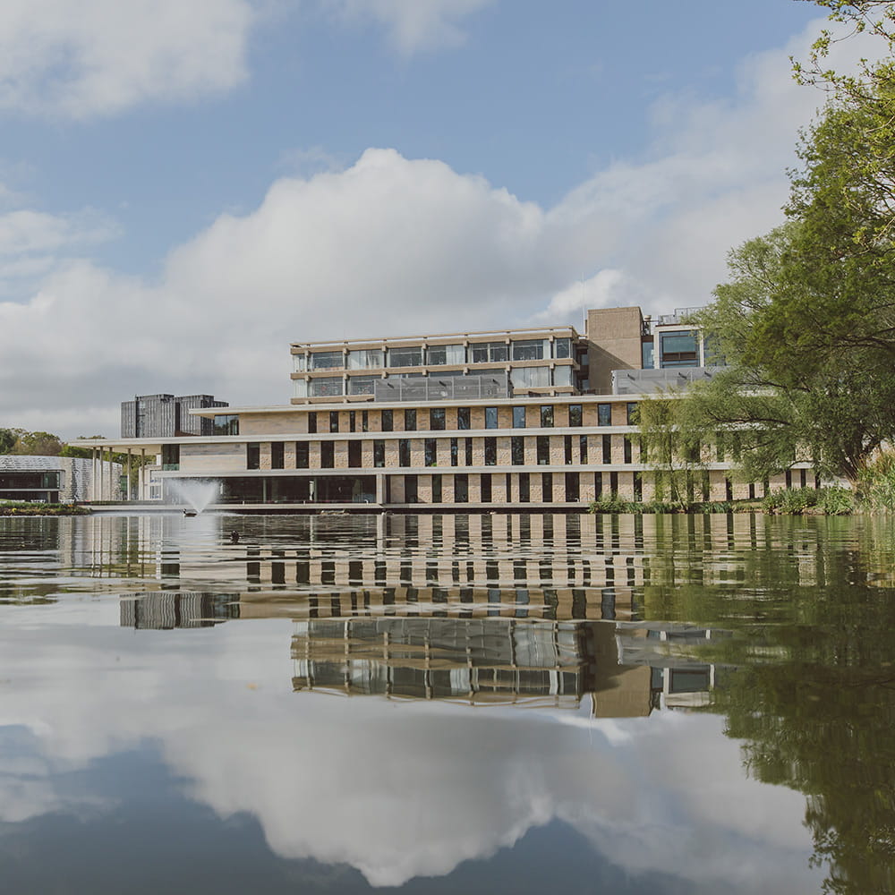 Colchester Campus lake and surrounding buildings