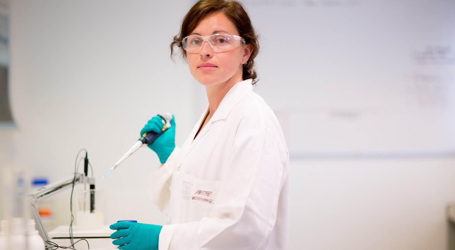 Student in a biomedical lab conducting research