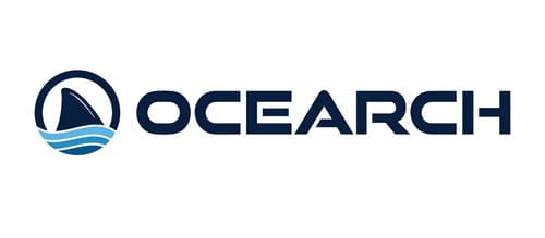 On the left is a dark blue fin sticking out of blue waves, on the right the word "Ocearch" in dark blue font.