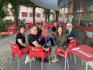 group of people at pavement cafe