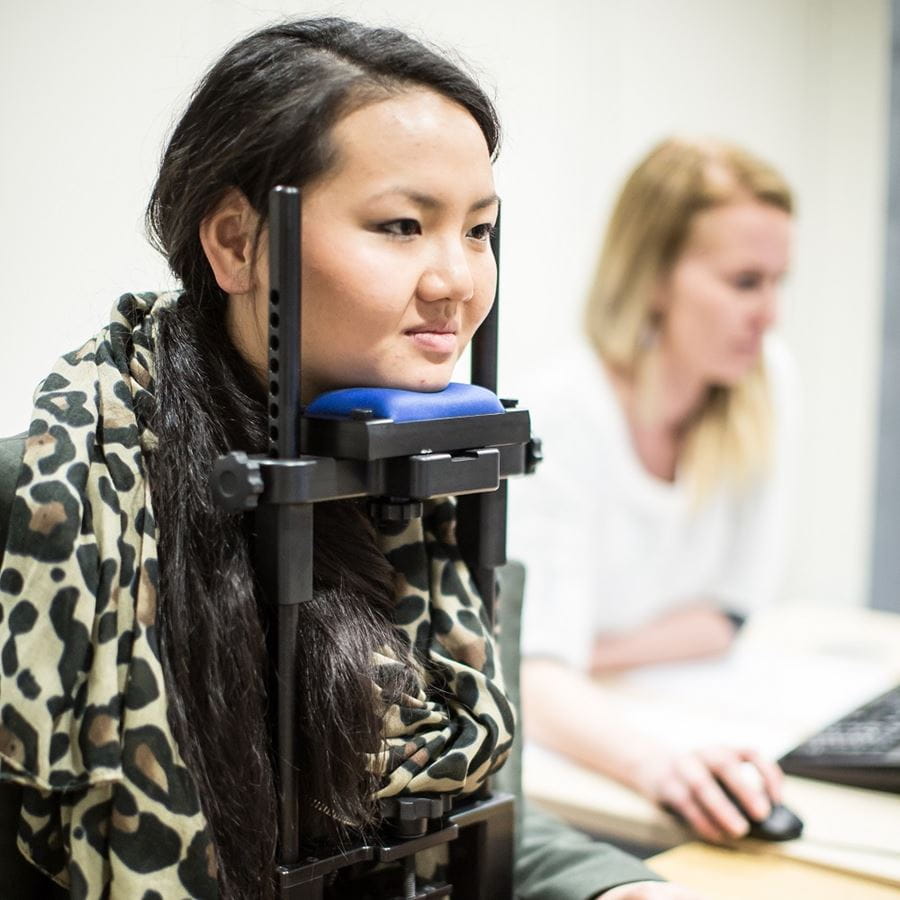 Image of a female student involved in a psychology eye-tracking experiment